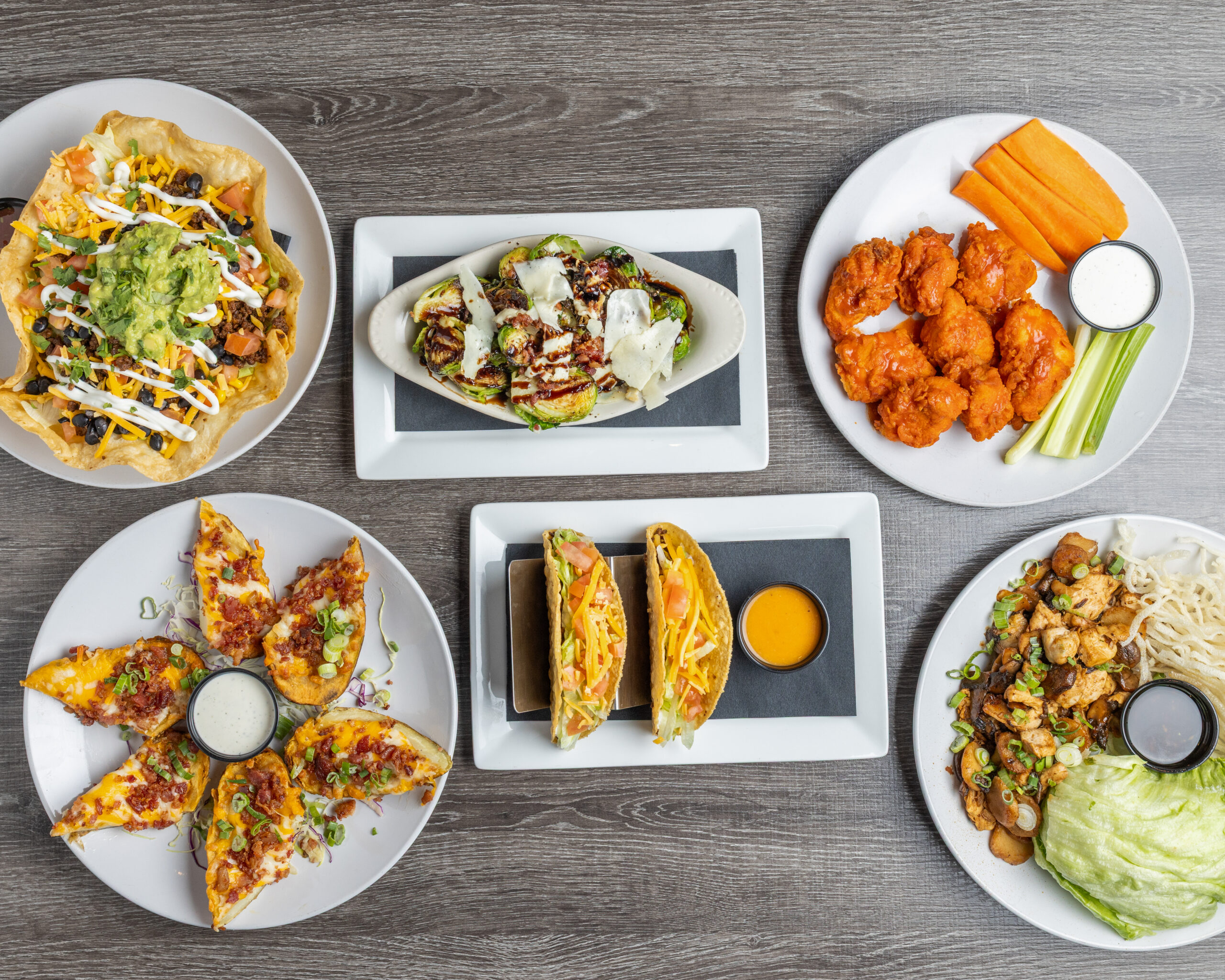 Tray platters of food from The Junction Bar and Grill, ready for catering